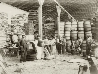 Interior of a cask factory at Zichron Yaacov with workers, c.1898-1900
